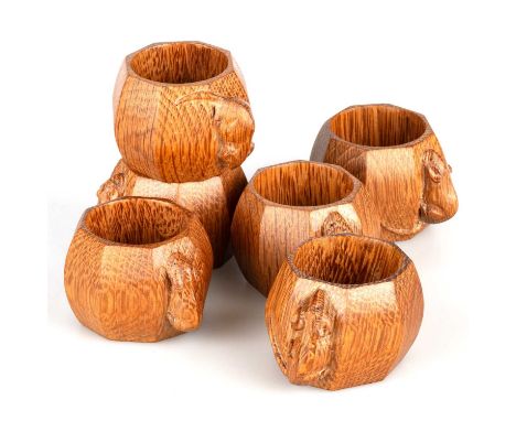 ROBERT THOMPSON OF KILBURN, SIX MOUSEMAN OAK NAPKIN RINGS octagonal form, each with carved mouse signature. (6) 5cm diameterI