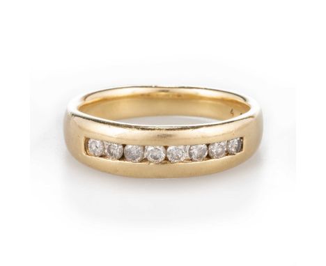 A DIAMOND HALF HOOP RING round brilliant-cut diamonds channel-set to a plain band. Estimated total diamond weight 0.40ct, mar