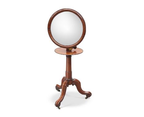 A 19TH CENTURY MAHOGANY ADJUSTABLE SHAVING MIRROR the circular mirror swivelling and rising on a tapering columnar stem above