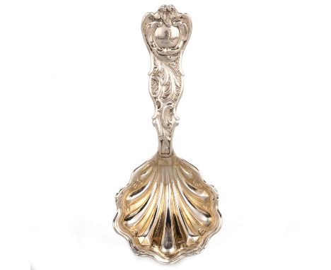 A VICTORIAN SILVER CADDY SPOON probably by Francis Higgins II, London 1863, with shell-form bowl, engraved with a crest. 10cm