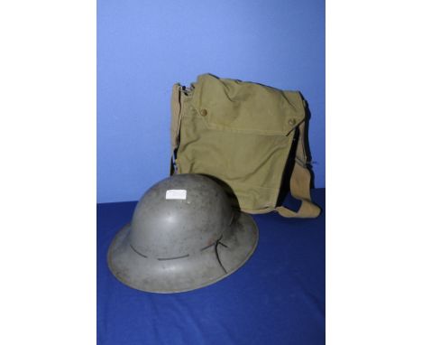 WWII period steel helmet with liner dated 1941 and a respirator haversack (2)