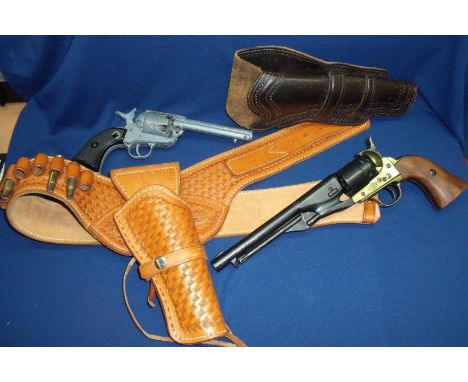 Replica Colt army percussion cap revolver, another similar replica revolver, tooled leather gun belt and holster, canvas hols