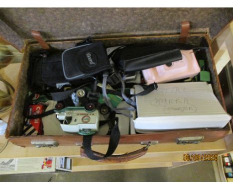 SMALL LEATHER SUITCASE CONTAINING CAMERA EQUIPMENT AND MODEL CARS