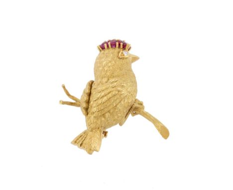 BEN ROSENFELD LIMITED, A RUBY, DIAMOND AND 18 CARAT GOLD BIRD BROOCH  LONDON 1960  The gold lesser redpoll with textured natu