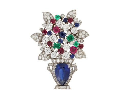 A MID 20TH CENTURY MULTI GEM GIARDINETTO BROOCH  The urn shaped base with a pear cut sapphire within a circular cut diamond s