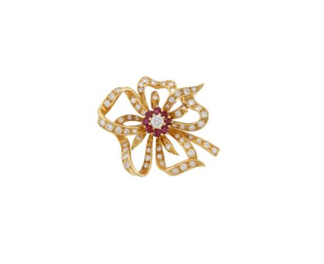 CROPP & FARR, AN 18 CARAT GOLD, RUBY AND DIAMOND FLOWER BROOCH  LONDON 1987 The pierced scrolled flower head set with brillia