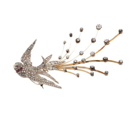 A VICTORIAN AND LATER SWALLOW AIGRETTE BROOCH  The gold backed silver swallow in flight set throughout with rose cut diamonds