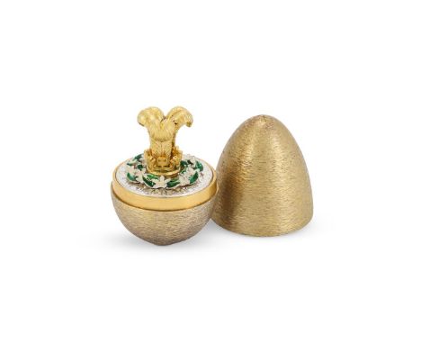 A SILVER GILT SURPRISE EGG STUART DEVLIN, LONDON 1981 Commemorating the wedding of Prince Charles and Lady Diana, the texture