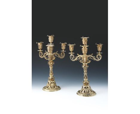 A PAIR OF MATCHED VICTORIAN SCOTTISH SILVER GILT FOUR LIGHT CANDELABRA WILLIAM MARSHALL, EDINBURGH 1885, THE OTHER N. C, POSS