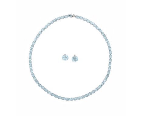 H STERN, AN AQUAMARINE RIVIÈRE NECKLACE AND EAR STUDS  The oval cut aquamarines in four claw white settings, with pierced sta
