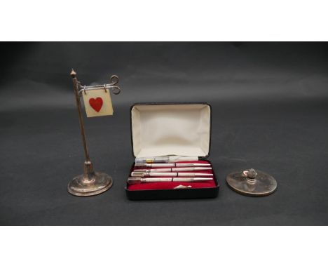 A silver and silver plate bridge set. Including a cased set of silver and enamel bridge marker/pencils with spare leads, an E