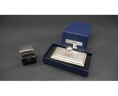 A boxed Silver blotter, hallmarked: Harrison Brothers &amp; Howson Ltd, Birmingham 1896 and a silver lidded leather travel in