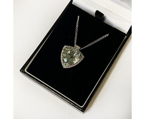 9 CT. WHITE GOLD CHAIN &amp; 18 CT. GOLD DIAMOND PENDANT AND GEMSTONE TO THE CENTRE