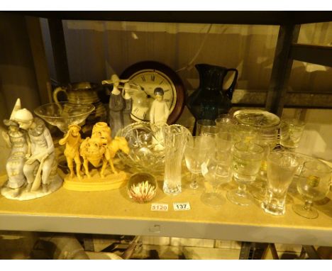 Shelf of mixed ceramics and glass