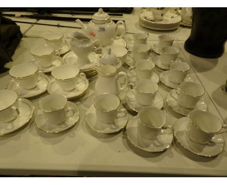 Large white ceramic dinner service with gold trim including Royal Worcester Contessa pattern