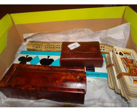 Two cribbage sets an antler score board set of walnut dominoes and two sets of vintage playing cards