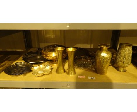 Shelf of mixed metalware including brass and copper