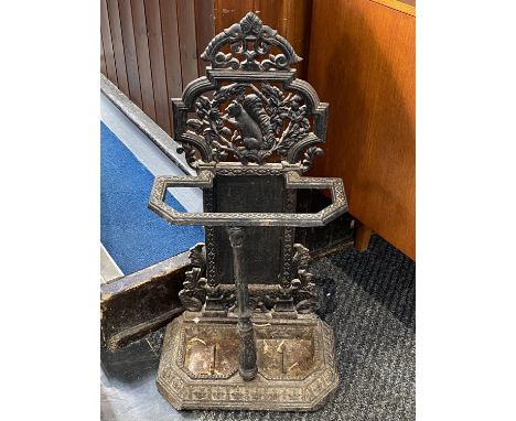 A Victorian cast iron two division stick stand, the squirrel surmount above a shaped beaded base, 84cm H