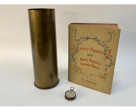 A brass Trench Art cylindrical vase, 28cm H, a 1939 'Mary Poppins and Mary Poppins Comes Back' publication and a silver cased