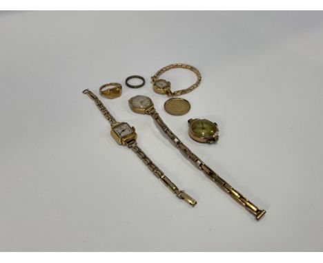A 9ct gold cased Rotary cocktail watch, a 9ct gold cased watch face, a 9ct gold signet ring, an eternity ring and two other w