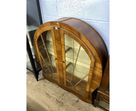 An Art Deco walnut spherical china cabinet, 128cm H, 119cm Diameter, 33cm D