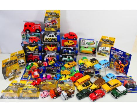 Tonka - Peterkin - Schylling - Others  A mixed lot of boxed / carded and unboxed plastic, diecast, tinplate, model vehicles a