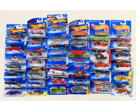 Hot Wheels - A collection of 40 carded Hot Wheels diecast model vehicles. Lot includes '2003 First Editions 18/42' Bugatti Ve
