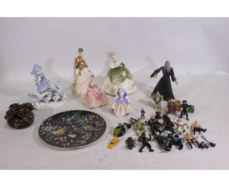 A collection of ceramic figures / groups to include Royal Doulton HN2312 Soiree, Royal Worcester and similar, largest approxi