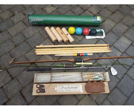 Outdoor sports - a garden croquet set by Debenhams, six tubular metal arrows by Practistreak, both boxed, two vintage bows of
