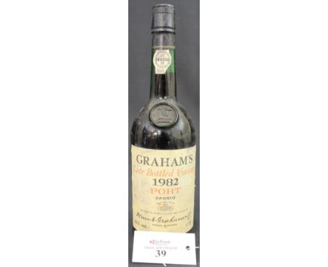 Graham's Late Bottled Vintage 1982 Port, 20% vol., 70cl. CONDITION REPORT: Liquid level middle of neck, labels in tact, but p