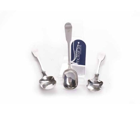THREE VICTORIAN SCOTTISH SILVER FIDDLE PATTERN PRESERVE SPOONS
including a spoon marked maker James Wright, Edinburgh 1870, h
