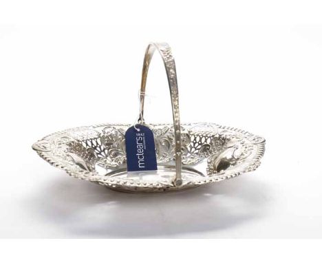EDWARDIAN SILVER COMPORT
maker Snow & Ashworth, Birmingham 1903, embossed with scrolling foliate pattern, putti figures and a