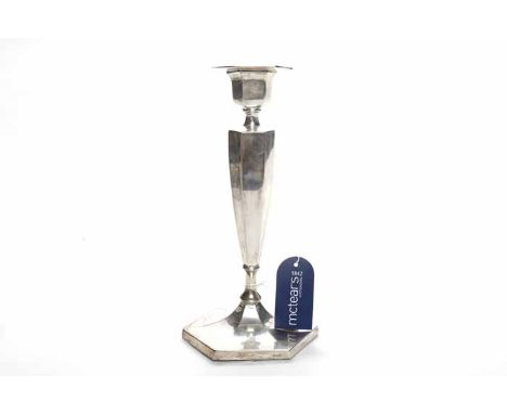 GEORGE V SILVER SINGLE CANDLESTICK
maker I M Hutchfield, Birmingham 1919, of hexagonal form, approximately 491g (base loaded)