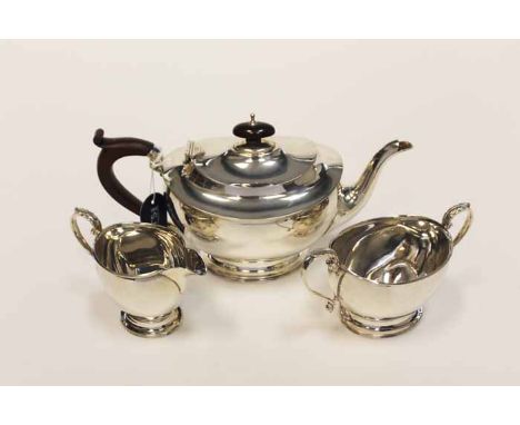 GEORGE V SILVER THREE PIECE TEA SERVICE
maker Adie Brothers Ltd, Birmingham 1931, of plain oval form, approximately 1010g, te