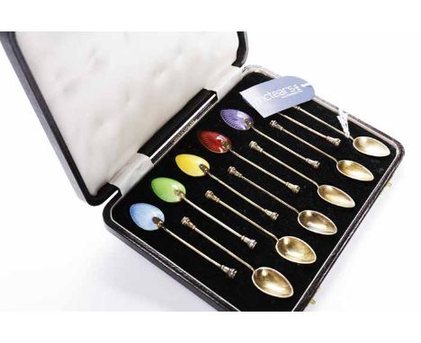 SET OF TWELVE SILVER GILT AND GUILLOCHE ENAMEL COFFEE SPOONS
maker Barker Brothers Silver Ltd, Birmingham 1956, two spoons wi