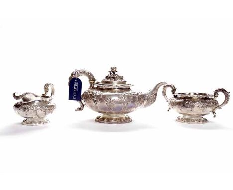 ATTRACTIVE GEORGE IV SILVER THREE PIECE TEA SERVICE
maker Rebecca Emes & Edward Barnard I, London 1827, elaborately embossed 