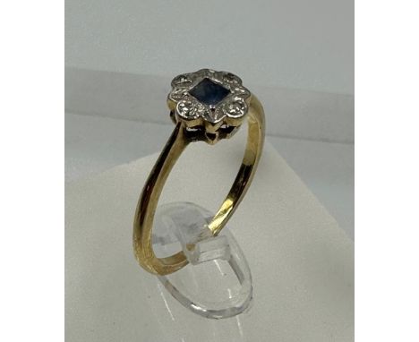 An 18ct diamond and blue central stone antique ring, approximate size \m