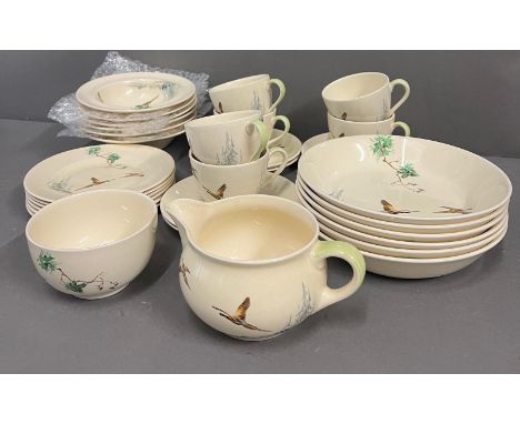 A six piece Royal Doulton coppice part tea service Condition Report Hairline crack to jug, crazing to sugar bowl and some sid