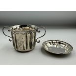 A silver lidded sugar bowl marked to base Carrington & Co 130 Regent Street, hallmarked London 1892,