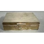 A Garrard and Co silver cigarette box with machine tooled decoration, Hallmarked for London 14cm x