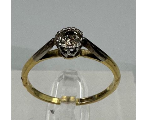 An 18ct gold diamond ring, approximate size N