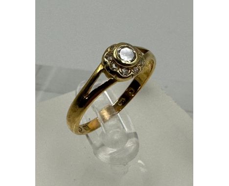 A 22ct gold Victorian ring with central diamond, approximate total weight 2.6g, size P