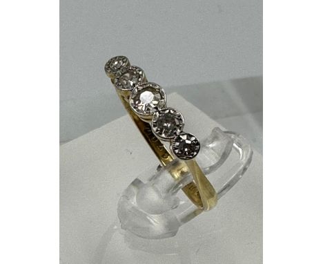 A five stone antique diamond ring on platinum and gold setting Size N