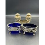 A selection of silver cruets by C S Harris & Sons Ltd of London from 1913 to include two pepper