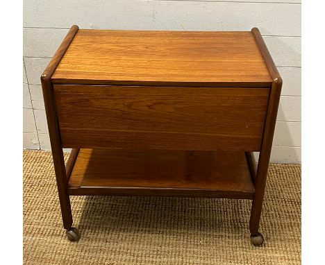 A vintage teak drinks trolley (H67cm W68cm D45cm)
