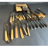 A selection of silver plated cutlery to include knives, forks and a case set of fish knives and