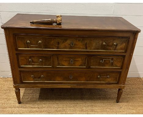 A Louis style commode with three drawers between fluted uprights (H84cm W114cm D47cm)Condition Report Woodworm has been treat