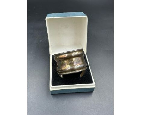 A Birmingham hallmarked silver napkin ring, boxed