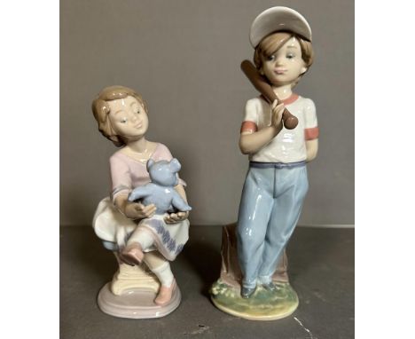 Two boxed Lladro figures, a young boy playing baseball and a girl with a teddy bear Condition Report good condition&nbsp;