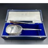 A Mappin and Webb hallmarked Child's silver brush and comb set, cased with original receipt.
